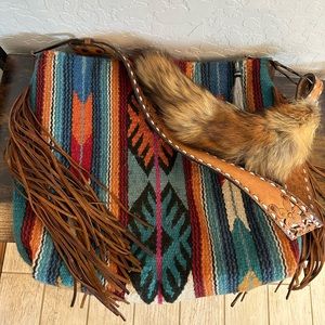 Saddle blanket bag with coon tail and custom leather strap